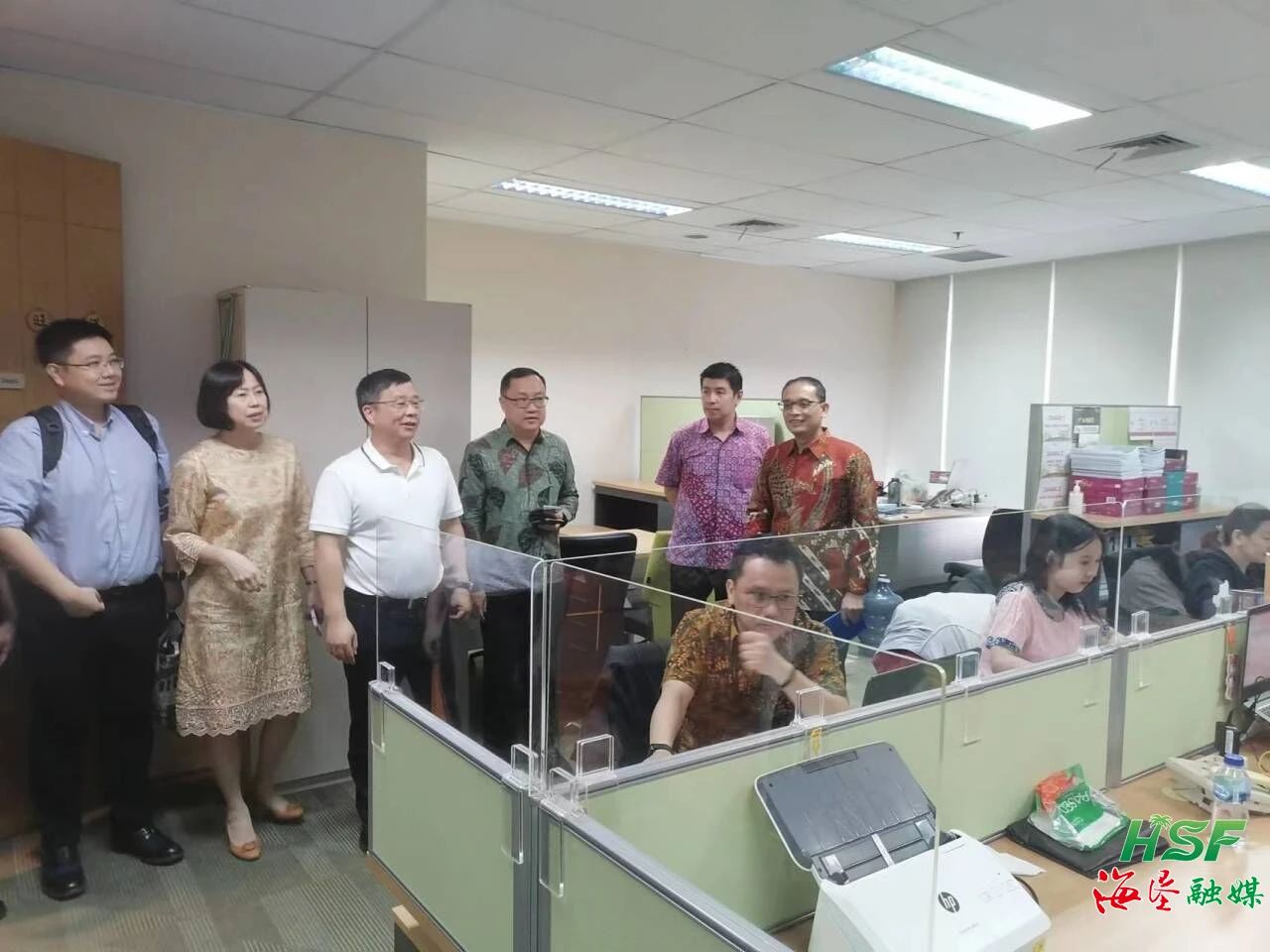 包洪文一行到KM公司调研。